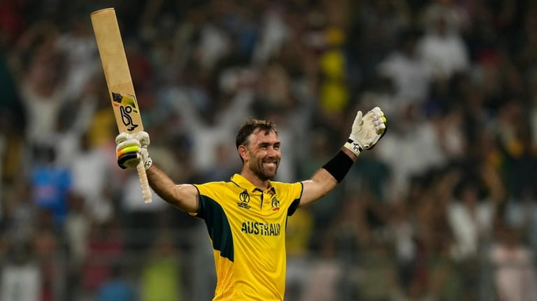 Australia's Glenn Maxwell celebrates after their win in the ICC...