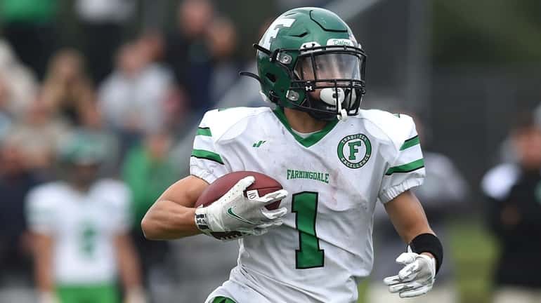 Tomaso Ramos, Farmingdale running back, dashes downfield after finding an...