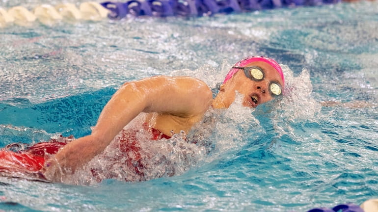 Sacred Heart Academy’s Cavan Gormsen competes in the 500-yard freestyle...
