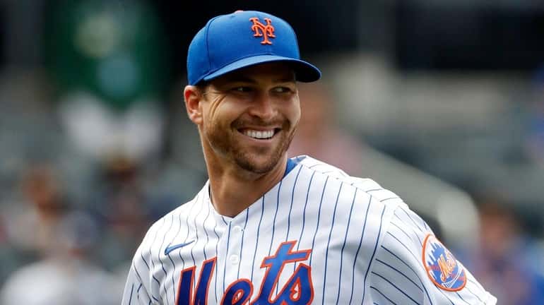 Jacob deGrom of the Mets smiles after the final out...