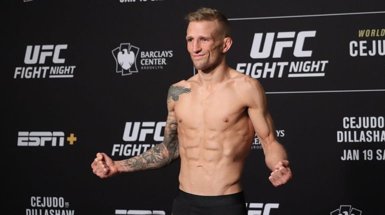 TJ Dillashaw weighs in for his UFC Brooklyn flyweight title...