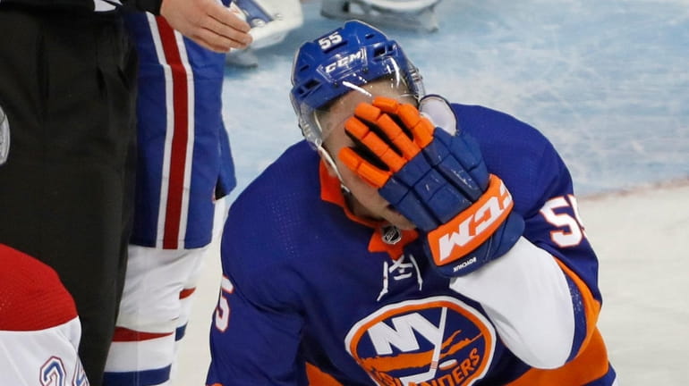 Islanders defenseman Johnny Boychuk after he was hit with a skate...
