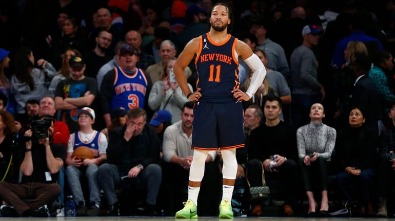 New York Knicks guard Jalen Brunsonstands alone after missing a...