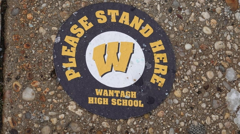 A marking on the ground outside Wantagh High School bears a reminder...