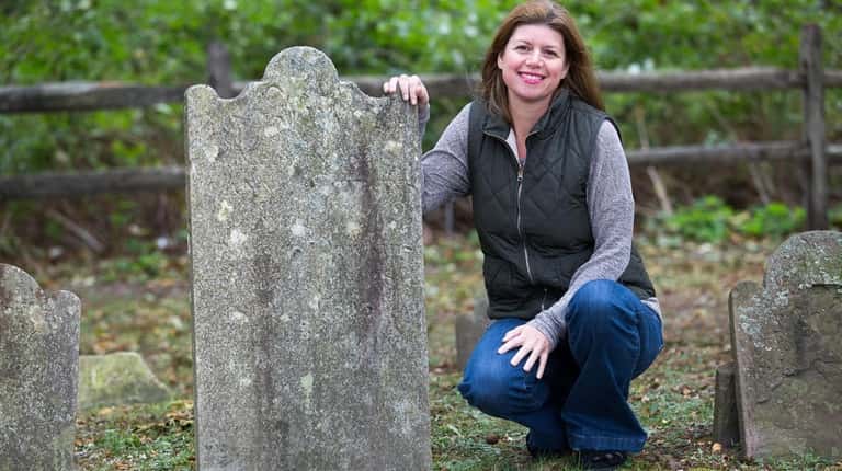 Shoreham genealogist Linda Metzger, seen here at Old Middle Country Road Cemetery...