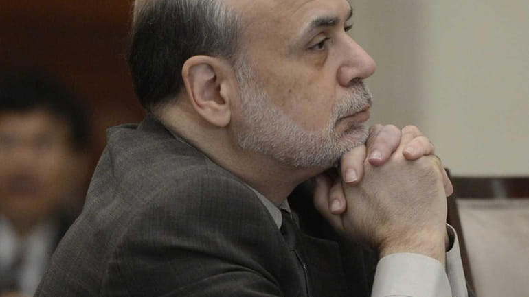 Fed Chairman Ben Bernanke, at an open meeting of the...