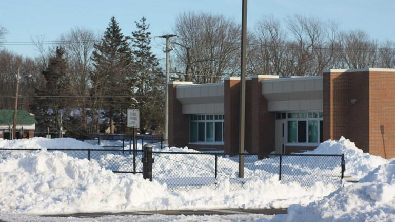 Waist-deep snow surrounds Connetquot School District's John Pearl Elementary School...