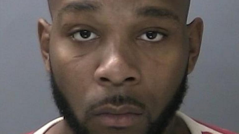Rakeem Holland, 27, of Bellport, faces multiple charges related to...