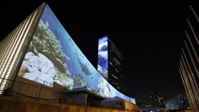 An architectural light show entitled illUmiNations: Protecting Our Planet, designed...