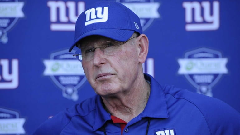 Giants head coach Tom Coughlin answers questions from the media...