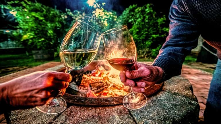 Sip wine by the fire pit at Il Giardino in...