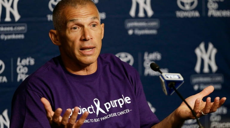New York Yankees manager Joe Girardi, wearing a Project Purple...