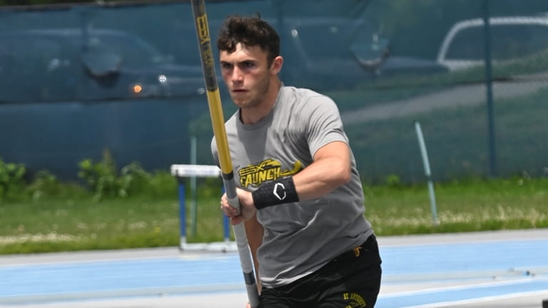 Nicholas Lourenco of St. Anthony pole vaults in the boys...