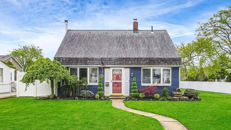 The 1,192-square foot three-bedroom, one-bath Cape was expanded, with a dormer...