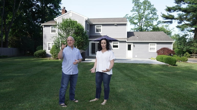 Randi and Michael Jaffe in the backyard of their Syosset...