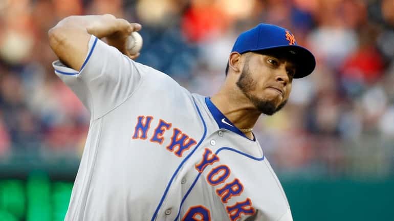 Mets starting pitcher Wilmer Font throws to the Washington Nationals...