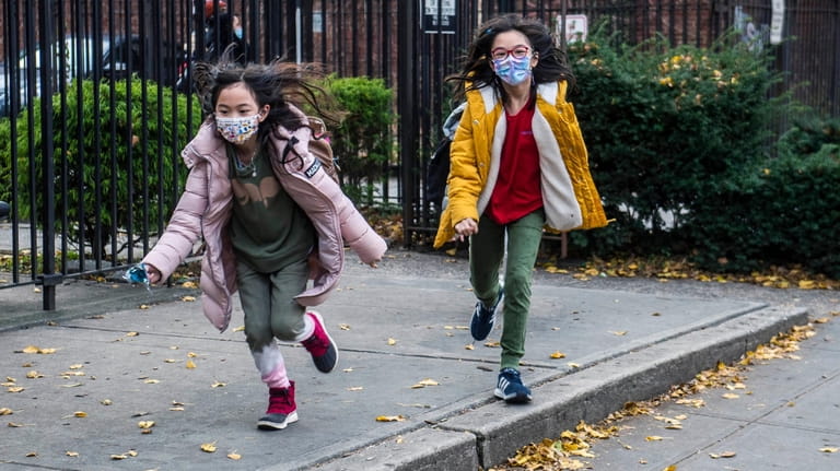 Students leave school in Manhattan on Dec. 21.