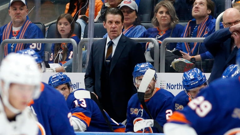 Head coach Lane Lambert of the Islanders looks on during a...
