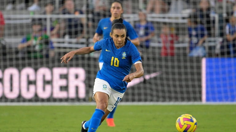 Brazil forward Marta (10) controls the ball during the second...
