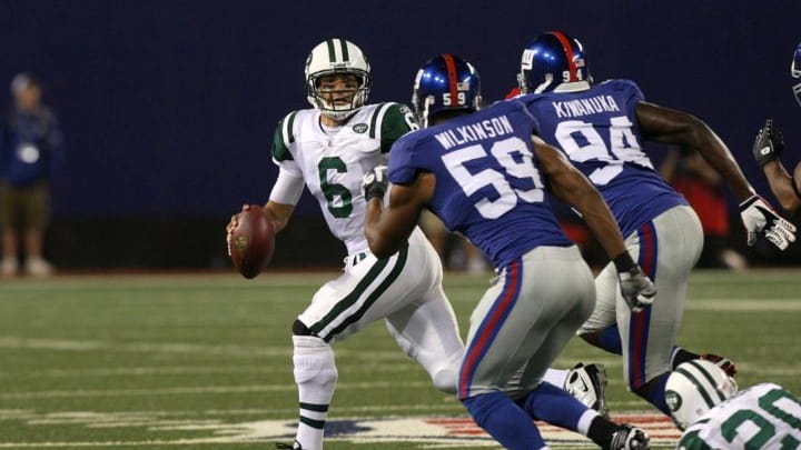 Quarterback Mark Sanchez #6 of the New York Jets looks...