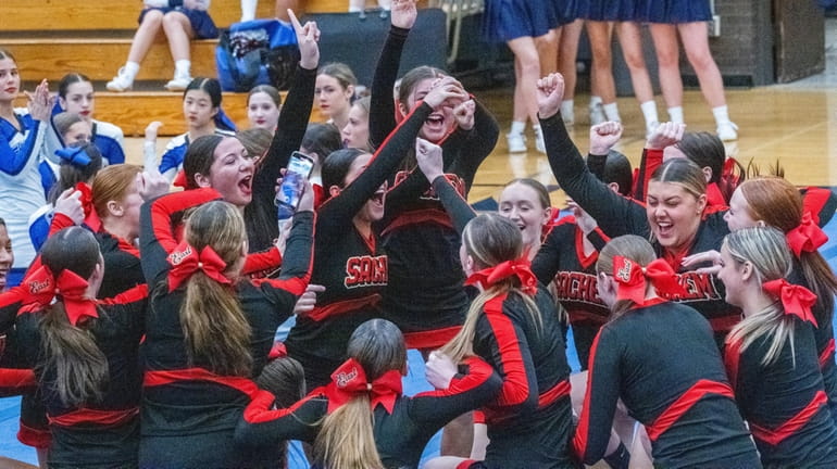 Sachem East cheerleaders win the first session of a Suffolk Division...