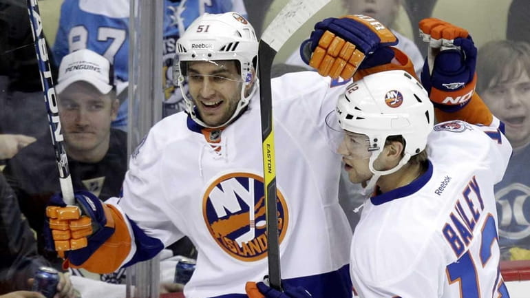 Frans Nielsen (51) celebrates his first-period goal with teammate Josh...