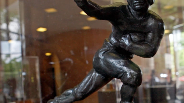 The Heisman Trophy, awarded to Reggie Bush in 2005, is...