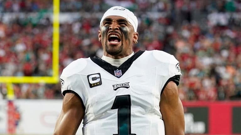 Philadelphia Eagles' Jalen Hurts reacts before an NFL football game...