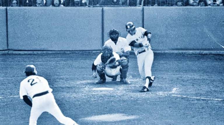 The Yankees's Bucky Dent hits a home run off  Boston's...