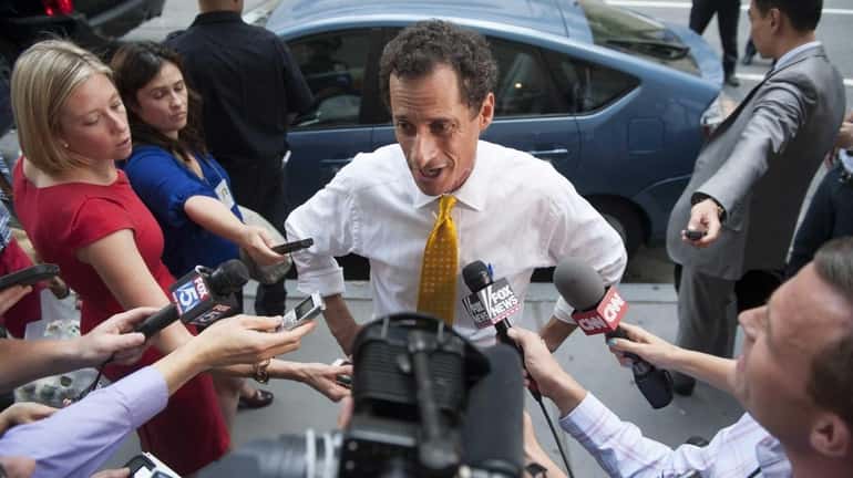 Anthony Weiner speaks to the media after he testified at...