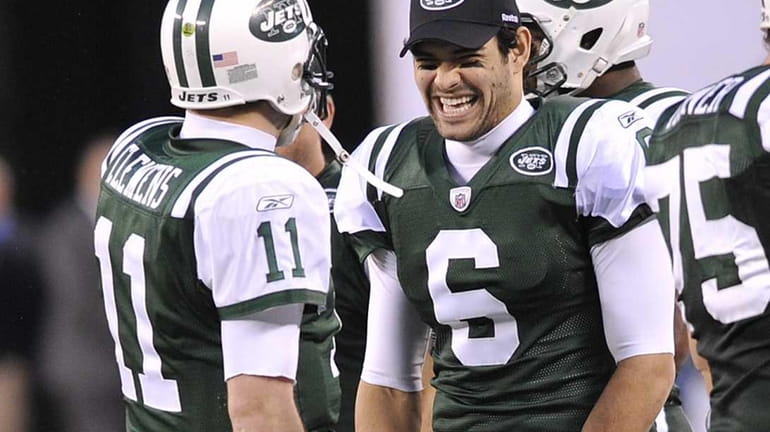 Jets quarterback Mark Sanchez smiles at the fourth quarter success...