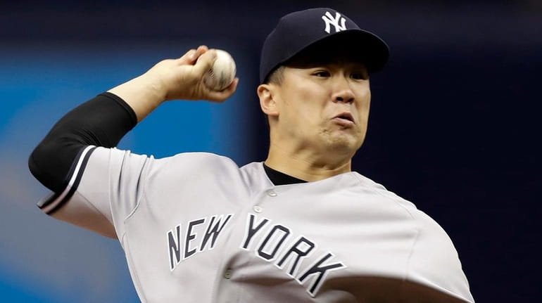 New York Yankees' Masahiro Tanaka pitches to the Tampa Bay...