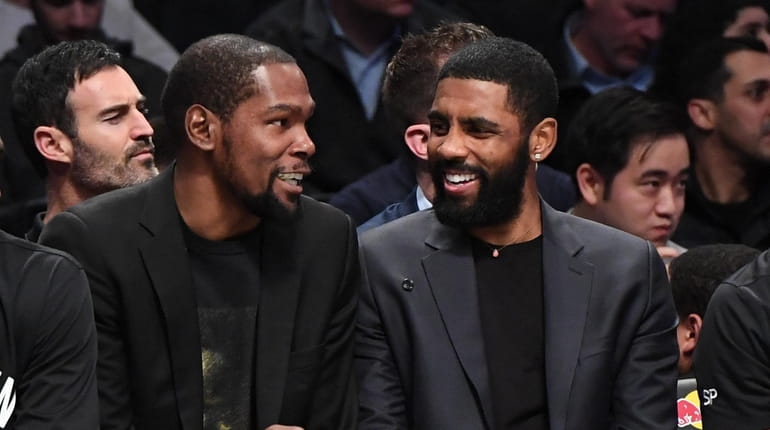 Kevin Durant and Kyrie Irving, who will play together for...