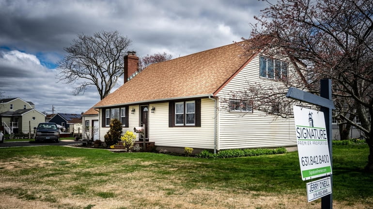 A home for sale on South Bayview Avenue in Amityville. Across...