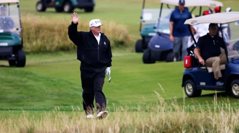 President Donald Trump on the green on July 14, 2018,...