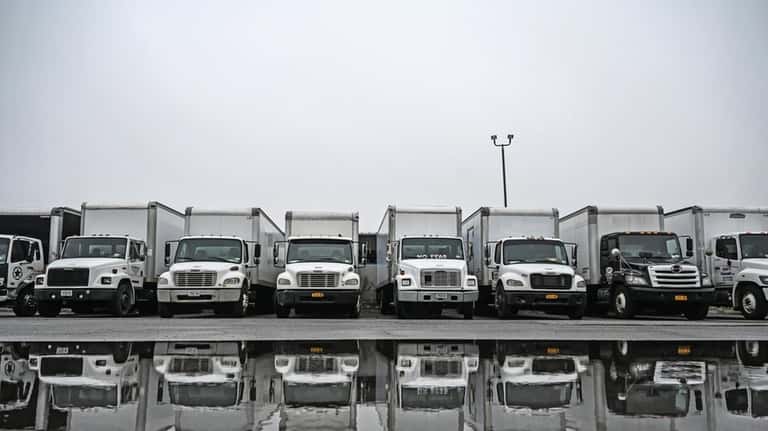 Trucks in the yard at Shea Trucking in West Babylon.  President...