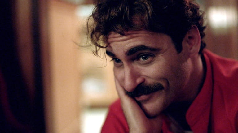 Joaquin Phoenix as Theodore in Warner Bros. Pictures' 2013 movie...