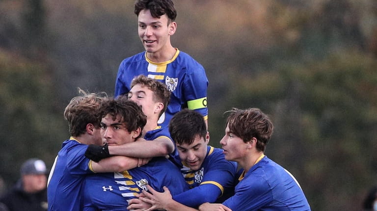 West Islip won its first state Class AA boys soccer...