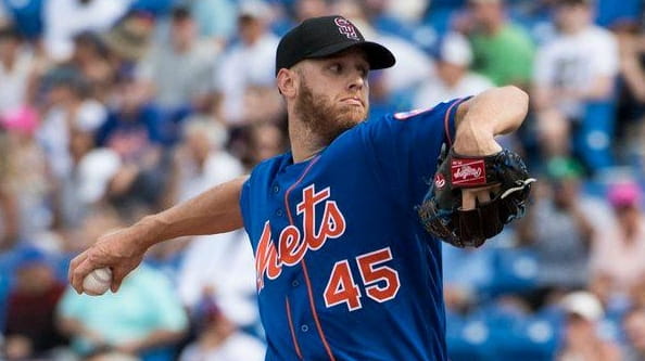 Mets pitcher Zack Wheeler throws the ball during a spring...