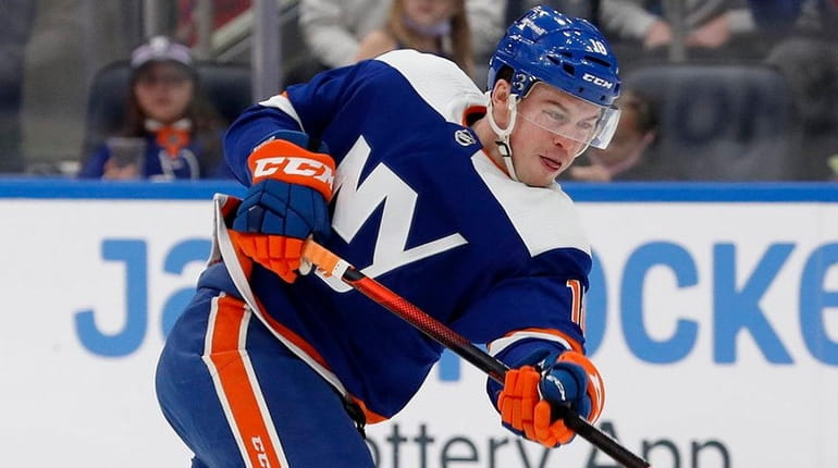 Anthony Beauvillier of the Islanders shoots the puck during the first period...