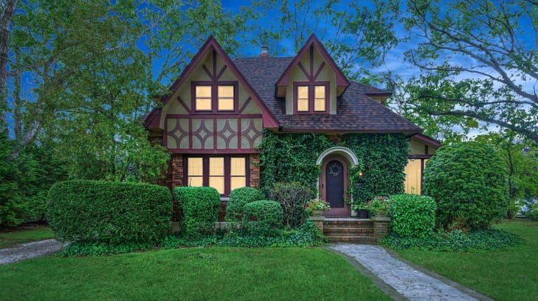 Priced at $450,000, this Tudor on Chestnut Avenue features a...