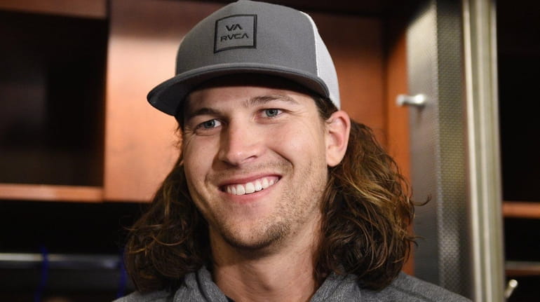 New York Mets pitcher Jacob deGrom speaks to the press...