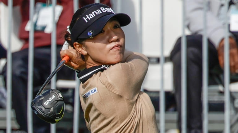 Lydia Ko, from New Zealand, watches tee shot on the...