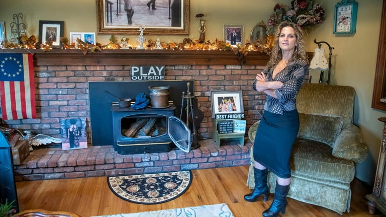 Enza Brandi's wood-burning stove can heat her entire Northport home.