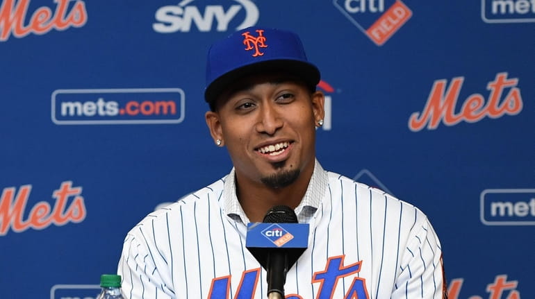 New York Mets Edwin Diaz reacts during a press conference...