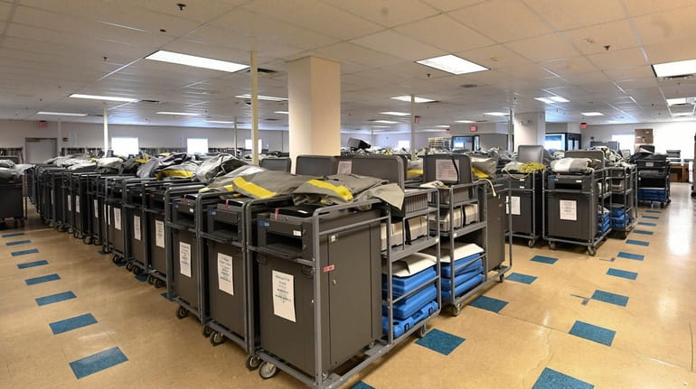 Voting equipment for polling centers stored at the Albany County...