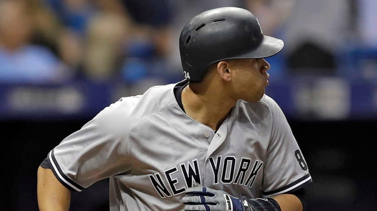 New York Yankees' Gary Sanchez drops his bat as he...