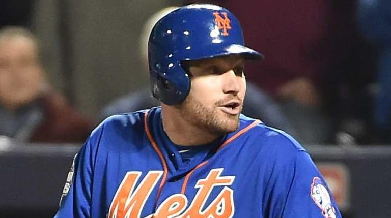 Mets second baseman Daniel Murphy reacts to the call by...