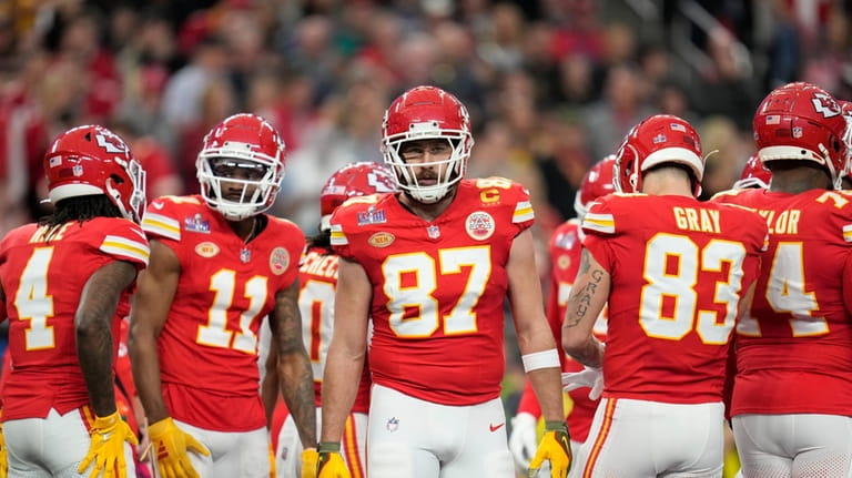 Kansas City Chiefs tight end Travis Kelce (87) stands with...