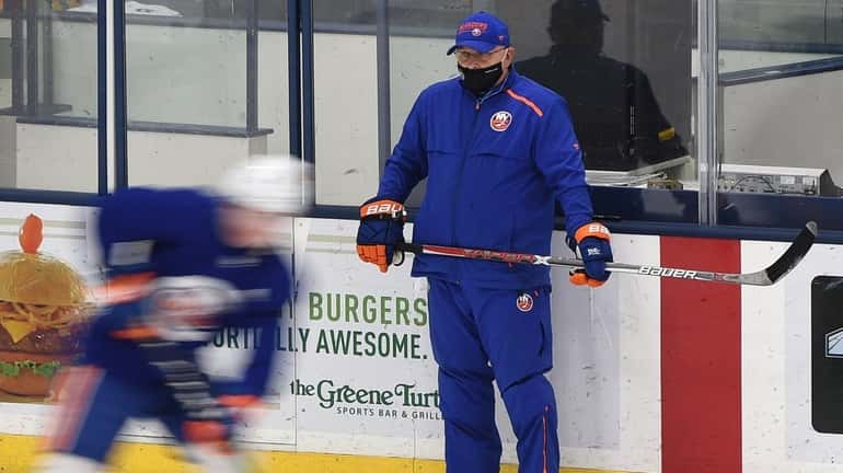 Islanders head coach Barry Trotz observes action at Northwell Health...